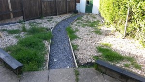 Patio and chipping clean up before from BigSul Garden and Maintenance Services